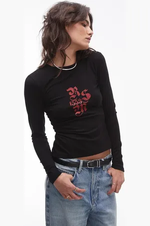 Résumé Resume long sleeve top with red glitter graphic in