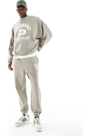 ASOS Co-ord oversized jogger with vintage varsity puff print in khaki - KHAKI