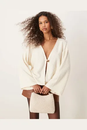 ASOS Boucle rib cardigan with gold detail button in cream