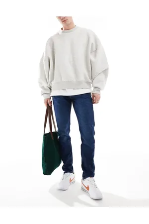 Calvin Klein Slim tapered jeans in dark wash