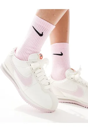 Nike Cortez Leather trainers in off-white and