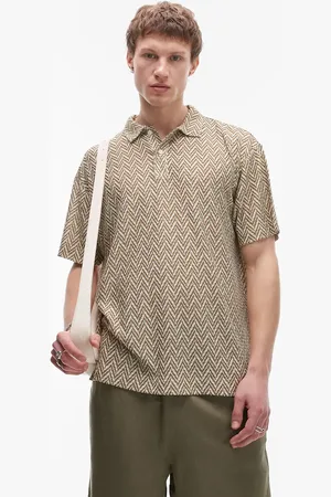 Topman Oversized fit polo with design jacquard in light