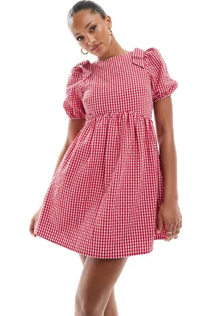 The Frolic Exclusive bow shoulder puff sleeve tie back mini smock dress in gingham