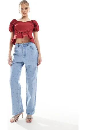 The Frolic Exclusive straight leg bow print jeans co-ord in light wash blue