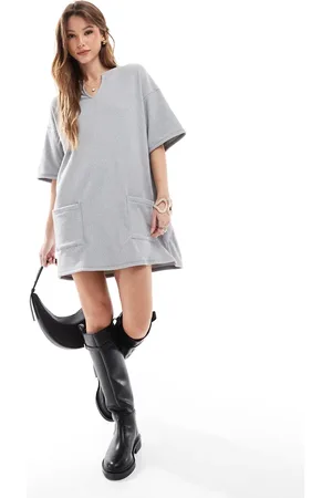 ASOS Ribbed slouchy T-shirt mini dress with pockets in