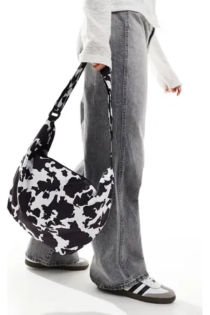 Pieces® XL bumbag in black and white cow print