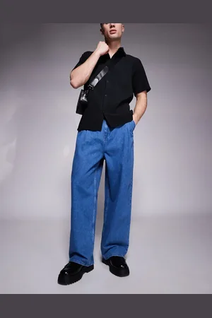 ASOS Oversized baggy jeans with side belts in mid wash