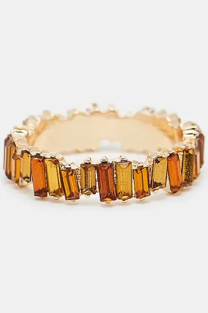 ASOS ASOS DESIGN Curve baguette ring with amber tonal stones in gold tone