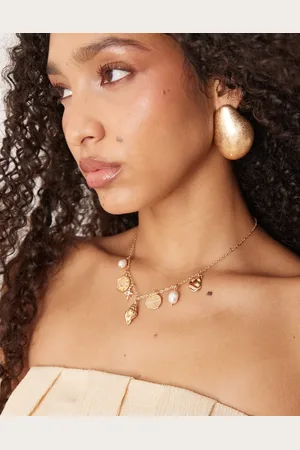 Accessorize Treasure charm sell necklace in