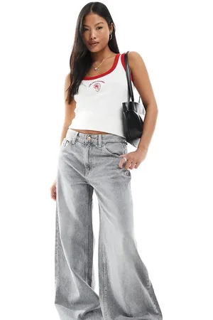 Bershka Petite high waisted wide leg jeans in