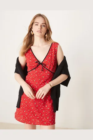 Glamorous V neck mini dress with bow in ditsy floral