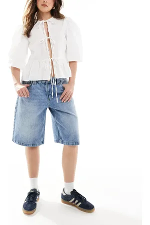 Bershka Baggy longline denim shorts in washed