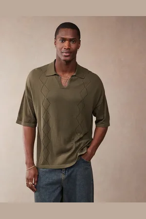 ASOS Relaxed boxy fit knitted notch neck polo with pointelle pattern in dark