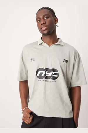 ASOS Boxy oversized polo with sports graphic in