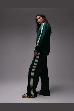 adidas Loose Fit Firebird track pants in dark Exclusive to ASOS