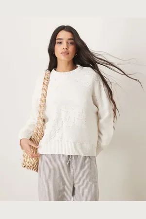ASOS Knitted crew neck jumper with flower stitch in cream
