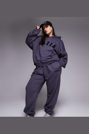Kaiia Plus embroidered logo cuffed joggers co-ord in dark