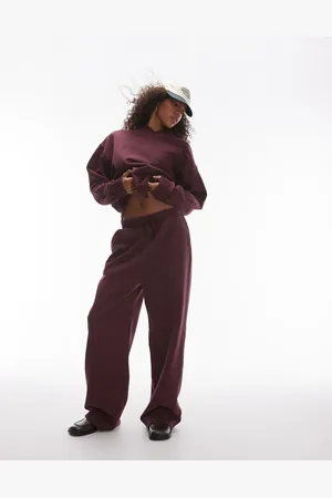 Topshop Acid wash wide leg jogger in burgundy