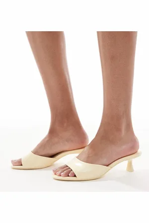 Bershka Heeled mules in butter