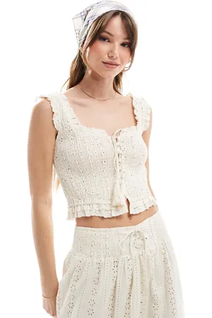 The Frolic Exclusive broderie shirred tie tassel detail crop top co-ord in cream