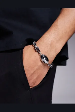 ASOS Waterproof stainless steel oversized bracelet with oval pendant in tone