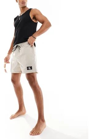 Calvin Klein Monogram nylon medium drawstring swim short in beige