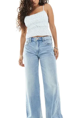 Bershka Petite high waisted wide leg jeans in light wash