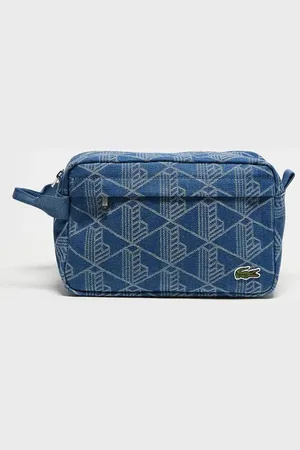 Lacoste Wash bag in all over monogram denim