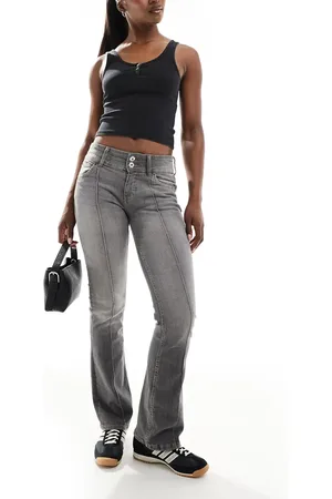 Bershka Low rise flared jeans in wash