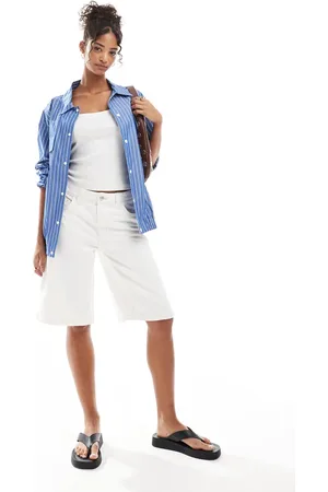 Bershka Baggy longline denim shorts in ecru
