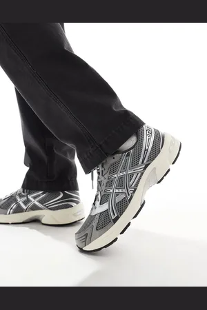Asics Gel-1130 trainers in dark and silver