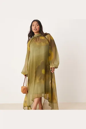 ASOS ASOS DESIGN Curve tie neck maxi smock dress with high low hem in blurred oversize floral print