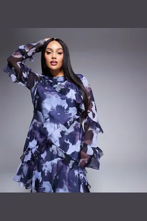 ASOS ASOS DESIGN Curve raw edge ruffle long sleeve mini dress in blue print