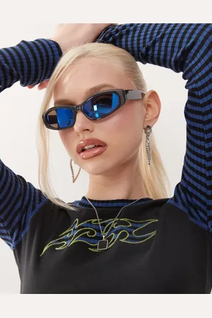 Weekday Sleek rectangle sunglasses with blue lens in dark