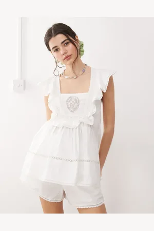 Reclaimed Sleevless smock top with emboirdery in whtie coord