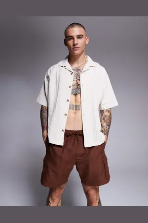 ASOS Swim shorts in mid length with cargo pockets in dark