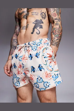 ASOS Swim shorts in short length with watercolour tile print in stone