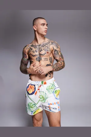 ASOS Swim shorts in short length with watercolour print