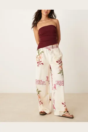 ASOS Linen blend pull on wide leg trousers with shirred waist detail in floral print