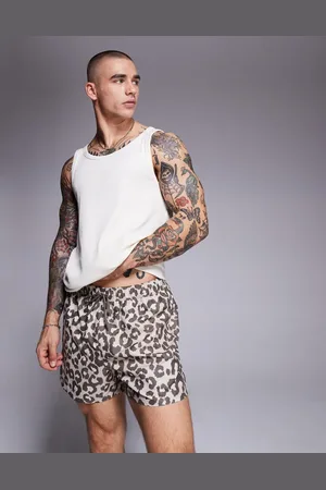ASOS Swim shorts in short length in leopard print