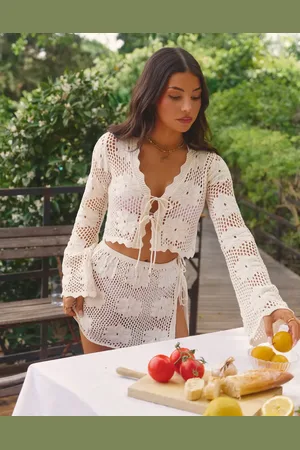 The Frolic X Lydia Kara exclusive crochet tie front long sleeve beach crop top co-ord in cream floral