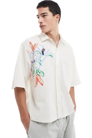 ASOS Boxy oversized shirt with floral print in stone