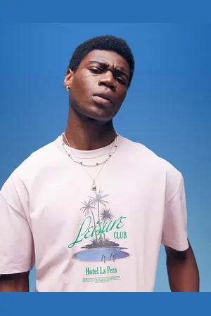 ASOS Boxy oversized t-shirt in heavyweight 220gsm with palm tree chest print in washed