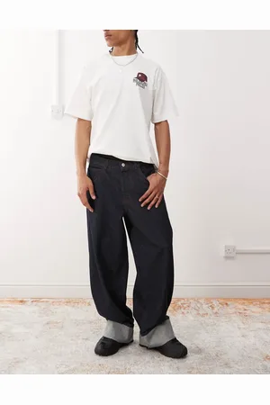 COLLUSION Baggy jeans with turn up hem in rinse wash