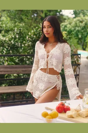 The Frolic X Lydia Kara exclusive crochet tie side mini beach skirt co-ord in cream floral