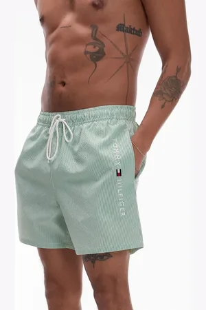 Tommy Hilfiger Side logo drawstring swim shorts in stripe