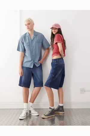 Reclaimed Unisex denim skate short in denim wash