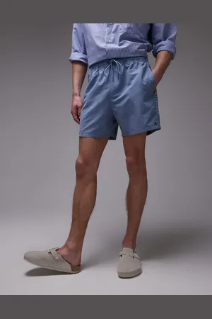 Tommy Hilfiger Drawstring flag taping swim shorts in blue