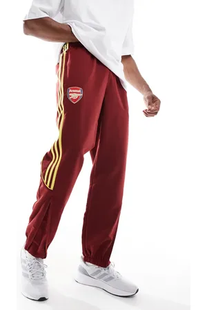 adidas Adidas Football Arsenal urban purist trackpants in burgundy and yellow