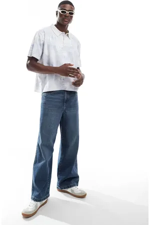 River Island Relaxed fit knitted polo in swirl